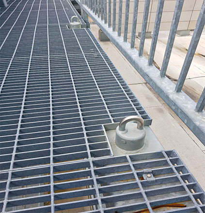 anchor installed on concrete roof being inspected